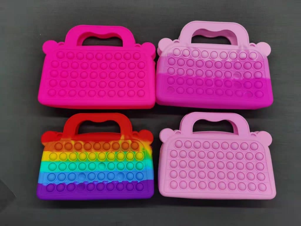 silicone purse with bobbles toys